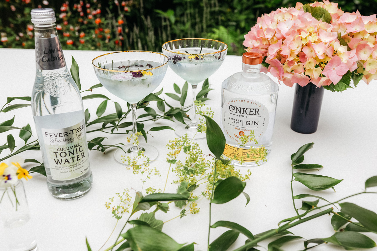 Fever tree tonic and conker gin on white tablecloth