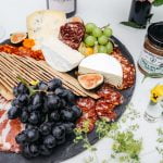 cheese and charcuterie on oval plate