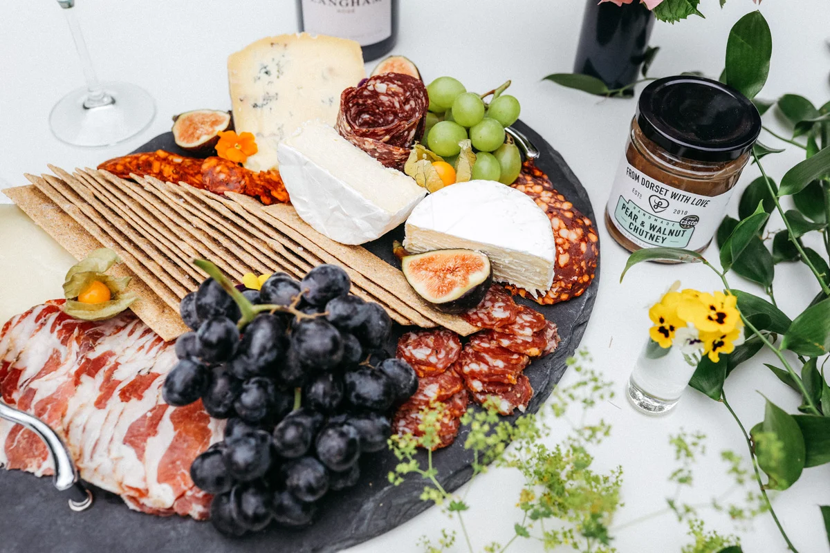 cheese and charcuterie on oval plate