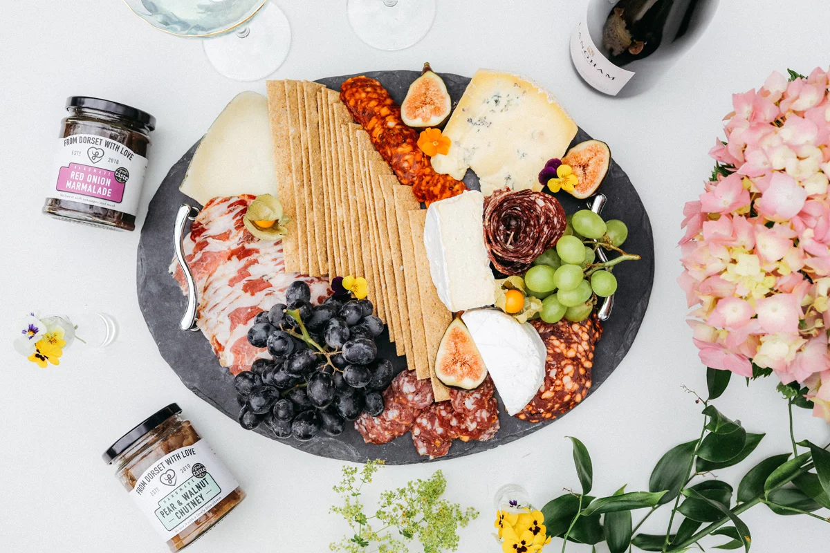 cheese and charcuterie on oval plate